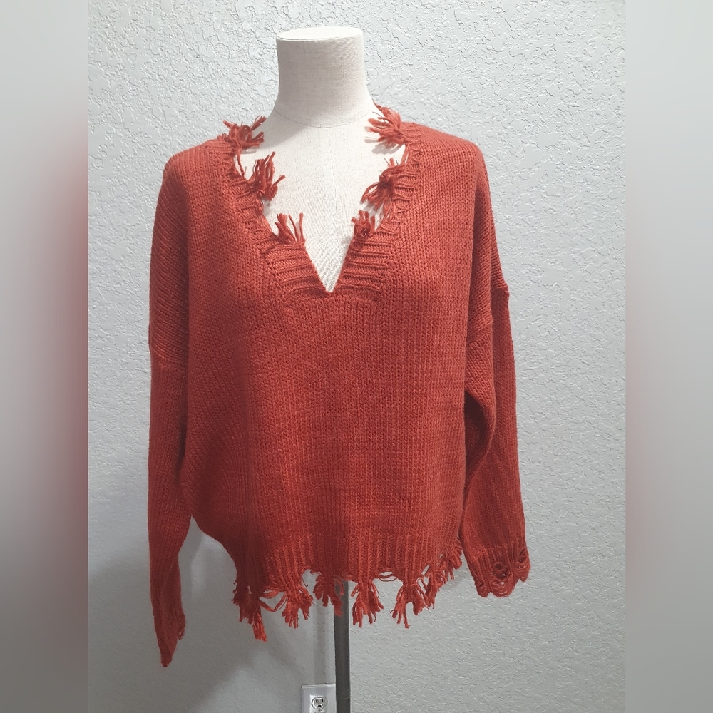 Distressed sweater